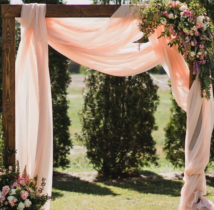 the best fabric for diy wedding arch draping - extra wide voile