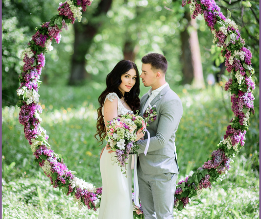 outdoor wedding ceremony with purple and white lilacs